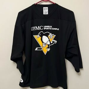 Youth boys size large Pittsburgh Penquins Hockey Jersey.